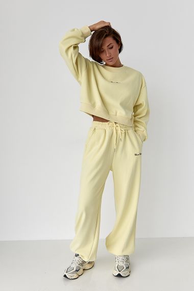 Спортивний костюм із плюшевим начісом з коротким світшотом та штанами палаццо - лимонний цвет, S/M (є розміри) | Зображення 4