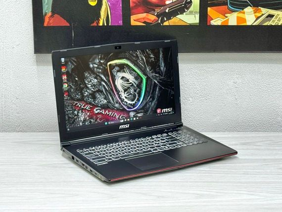Ігровий ноутбук MSI GP62 / 15.6" (1920x1080) TN / Intel Core i7-7700HQ (4 (8) ядра по 2.8 - 3.8 GHz) / 16 GB DDR4 / 128 GB SSD M.2 + 1000 GB HDD / nVidia GeForce GTX 1060, 3 GB GDDR5, 192-bit / WebCam / Win 11 б/в | Зображення 2