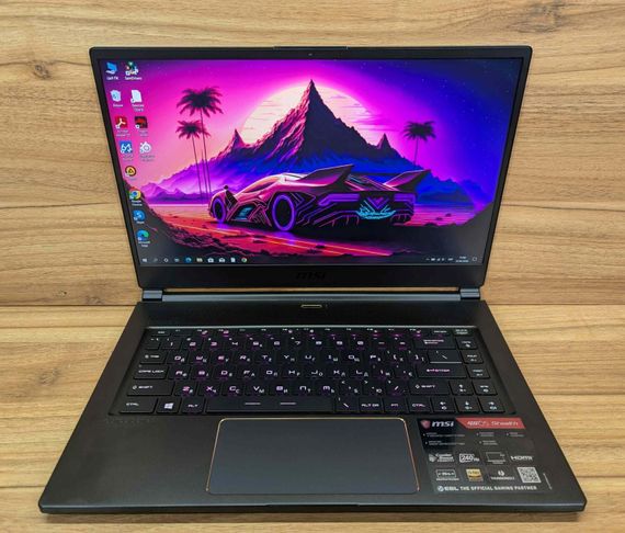Ігровий ноутбук Б-клас MSI GS65 Stealth 9SE / 15.6" (1920x1080) IPS / Intel Core i7-9750H (6 (12) ядер по 2.6 - 4.5 GHz) / 16 GB DDR4 / 512 GB SSD / nVidia GeForce RTX 2060, 6 GB GDDR6, 192-bit / WebCam / Windows 10 б/в + Подарунок Бездротова миша | Зображення 1