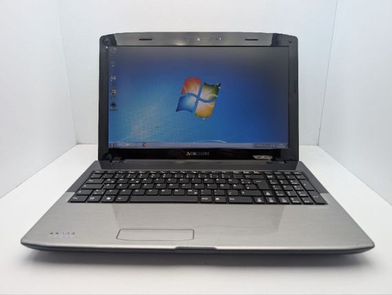 Ноутбук Medion Akoya E6234 / 15.6" (1366x768) TN / Intel Core i3-2310M (2 (4) ядра по 2.1 GHz) / 6 GB DDR3 / 250 GB HDD / Intel HD Graphics 3000 / WebCam / DVD-ROM / АКБ не держит б/у | Зображення 1