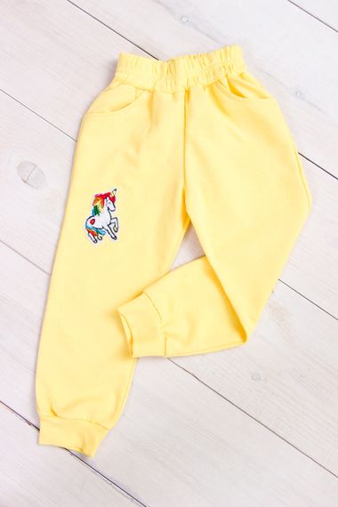 Штани для дівчинки з нашивкою Носи своє 98 Жовтий (p-5950-33989)