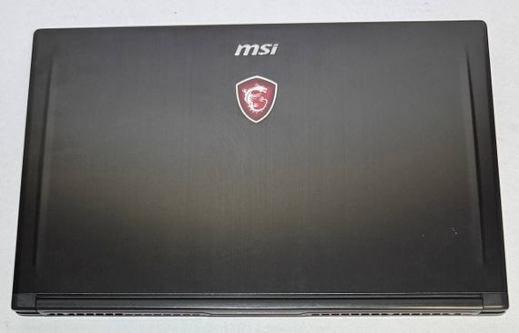 Игровой ноутбук Б-класс MSI GS63 Stealth 8RE / 15.6" (1920x1080) IPS / Intel Core i7-8750H (6 (12) ядер по 2.2 - 4.1 GHz) / 16 GB DDR4 / 512 GB SSD / nVidia GeForce GTX 1060, 6 GB GDDR5, 192-bit / WebCam / Win 11 Pro б/у | Зображення 1