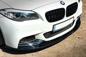 Накладка на передний бампер Lip OmsaLine (черная) для BMW 5 серия F-10/11/07 2010-2016 гг.