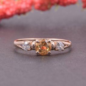 Кольцо из красного золота с цитрином 15.5