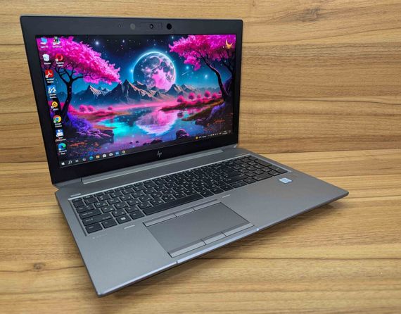 Мобильная рабочая станция HP zBook 15 G6 / 15.6" (1920x1080) IPS / Intel Core i7-9850H (6 (12) ядер по 2.6 - 4.6 GHz) / 32 GB DDR4 / 512 GB SSD / nVidia Quadro RTX 3000, 6 GB GDDR6, 192-bit / Fingerprint / WebCam / Windows 10 б/у + Подарок Мышь / USB | Зображення 3