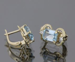 Сережки из красного золота с топазом