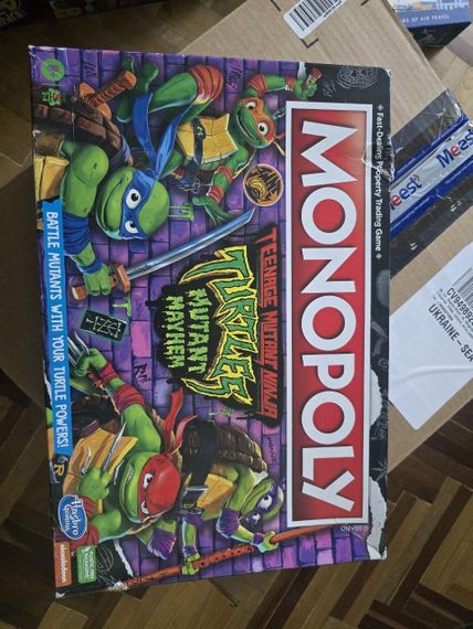 Настольная игра Monopoly. Teenage Mutant Ninja Turtles. Mutant Mayhem (Монополия. Ниндзя Черепашки) (английский) УЦЕНКА! | Зображення 8