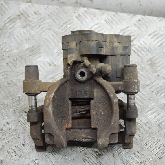 Супорт задній лівий Volkswagen Golf VII 2013-2019 гальмівний суппорт Фольксваген Гольф 7 5Q0615405AM