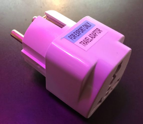 Універсальний перехідник з англійської вилки на європейську, 220V AU / US / UK to EU | Зображення 1