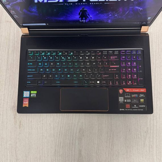 Ігровий ноутбук Б-клас MSI GS75 Stealth 9SF / 17.3" (1920x1080) IPS / Intel Core i7-10875H (8 (16) ядер по 2.3 - 5.1 GHz) / 16 GB DDR4 / 512 GB SSD / nVidia GeForce RTX 2060, 6 GB GDDR6, 192-bit / WebCam б/в | Зображення 2