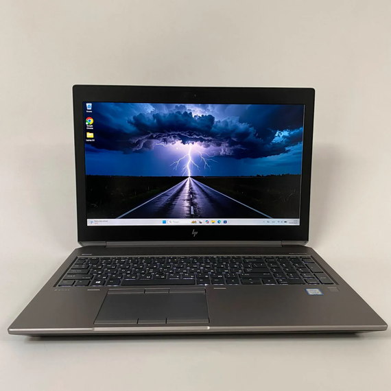 Ноутбук Б-класс HP zBook 15 G6 / 15.6" (3840x2160) IPS / Intel Core i9-9880H (8 (16) ядер по 2.3 - 4.8 GHz) / 32 GB DDR4 / 128 GB SSD + 500 GB HDD / nVidia Quadro T1000, 4 GB GDDR5, 128-bit / WebCam б/у+Подарок Беспроводная мышь USB | Зображення 1