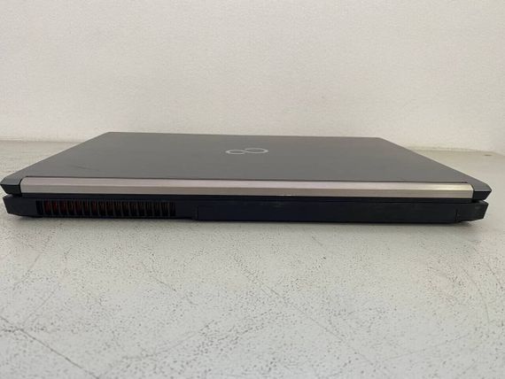 Мобільна робоча станція Fujitsu Celsius H730 / 15.6" (1920x1080) IPS / Intel Core i7-4800MQ (4 (8) ядра по 2.7 - 3.7 GHz) / 32 GB DDR3 / 256 GB SSD / nVidia Quadro K1100M, 2 GB GDDR5, 128-bit / WebCam / DVD-ROM б/в | Зображення 4