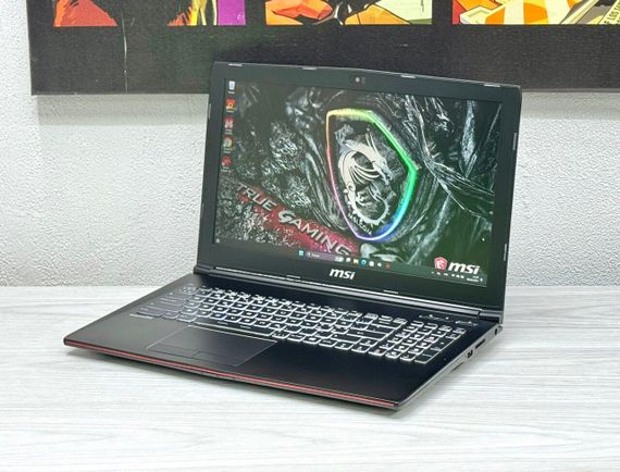 Ігровий ноутбук MSI GP62 / 15.6" (1920x1080) TN / Intel Core i7-7700HQ (4 (8) ядра по 2.8 - 3.8 GHz) / 16 GB DDR4 / 128 GB SSD M.2 + 1000 GB HDD / nVidia GeForce GTX 1060, 3 GB GDDR5, 192-bit / WebCam / Win 11 б/в | Зображення 3