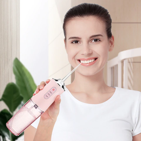 Ирригатор портативный Oral Irrigator 3 режима работы, 2 насадки | Зображення 5