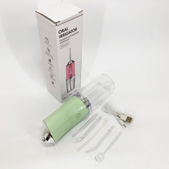 Іригатор для чищення зубів та порожнини рота Oral Irrigator з акумулятором та змінними насадками. Колір: зелений RP-47 | Зображення 3