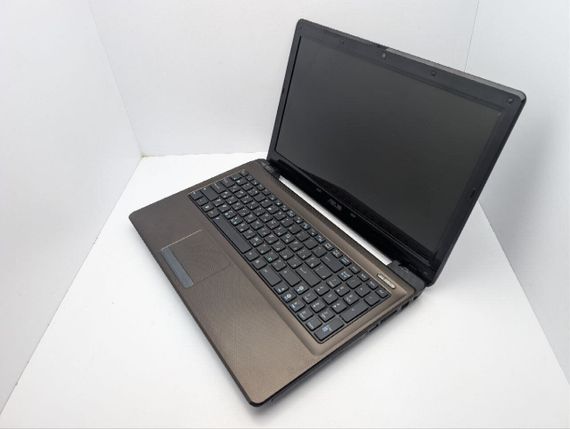 Ноутбук Asus K52N / 15.6" (1366x768) TN / AMD Athlon II P320 (2 ядра по 1.6 GHz) / 8 GB DDR3 / 320 GB HDD / AMD Radeon HD 4200 Graphics / WebCam / DVD-ROM / Без АКБ б/в | Зображення 6