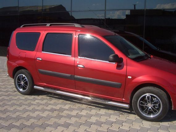 Бічні труби (2 шт., нерж.) 70 мм, з пластиковими вставками для Dacia Logan MCV 2004-2014 рр