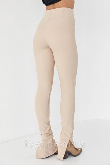 Женские лосины из эластичного трикотажа с разрезами цвет бежевый размер L FL_000660 | Зображення 1