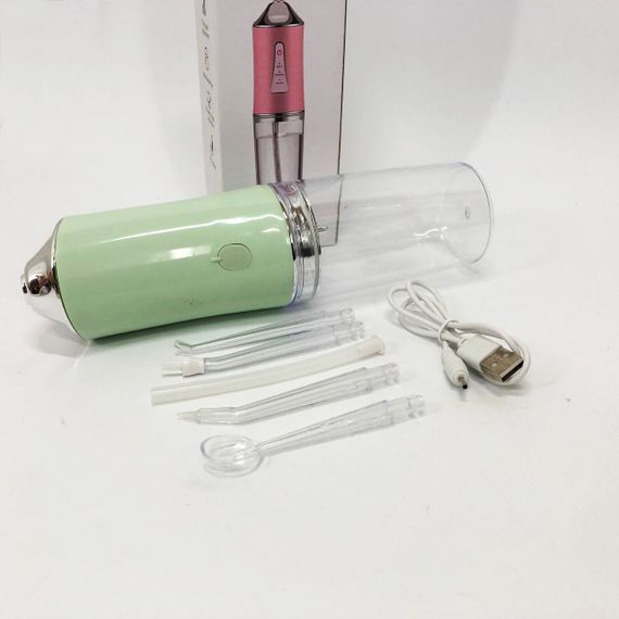Іригатор для чищення зубів та порожнини рота Oral Irrigator з акумулятором та змінними насадками. Колір: зелений RP-47 | Зображення 1