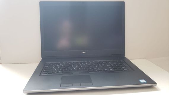 Мобильная рабочая станция Dell Precision 7730 / 17.3" (1920x1080) IPS / Intel Core i7-8850H (6 (12) ядра по 2.6 - 4.3 GHz) / 32 GB DDR4 / 128 GB SSD + 1000 GB SSD / nVidia Quadro P5200, 16 GB GDDR5, 256-bit / WebCam б/у | Зображення 1