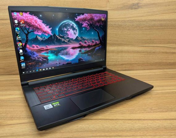 Игровой ноутбук MSI GF65 Thin 10uE / 15.6" (1920x1080) IPS / Intel Core i7-10750H (6 (12) ядер по 2.6 - 5.0 GHz) / 16 GB DDR4 / 512 GB SSD / nVidia GeForce RTX 3060, 6 GB GDDR6, 192-bit / WebCam / Windows 10 б/у + Подарок Беспроводная мышь / USB | Зображення 3