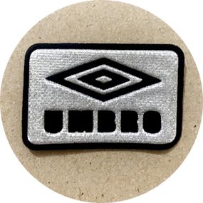 Нашивка на одяг (термо) Umbro 2 49*32 мм Срібляста
