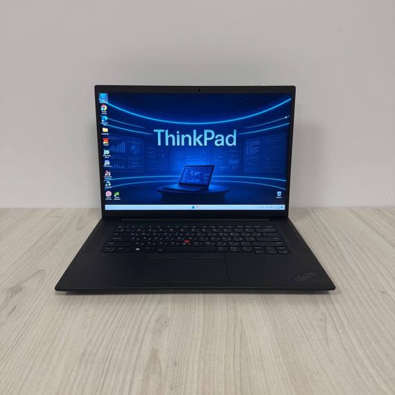 Ігровий ультрабук Lenovo ThinkPad P1 Gen 6 / 16" (2560x1600) IPS / Intel Core i7-13800H (14 (20) ядер по 2.5 - 5.2 GHz) / 32 GB DDR5 / 2000 GB SSD NVMe / nVidia GeForce RTX 4080, 12 GB GDDR6, 192-bit / WebCam б/в | Зображення 1