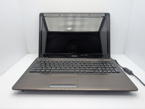 Ноутбук Asus K52N / 15.6" (1366x768) TN / AMD Athlon II P320 (2 ядра по 1.6 GHz) / 8 GB DDR3 / 320 GB HDD / AMD Radeon HD 4200 Graphics / WebCam / DVD-ROM / Без АКБ б/в | Зображення 2