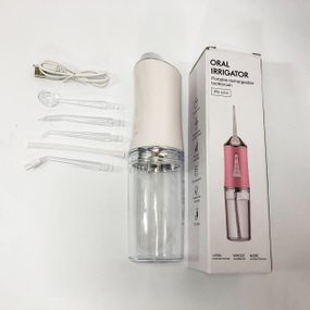 Ирригатор для чистки зубов и полости рта Oral Irrigator с аккумулятором и сменными насадками. Цвет: белый UC-52