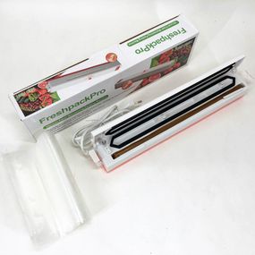Вакууматор Freshpack Pro вакуумний пакувальник їжі, побутової. JE-267 Колір помаранчевий
