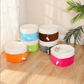 Лежанка для вихованців з високими бортиками 40*26см Рожева