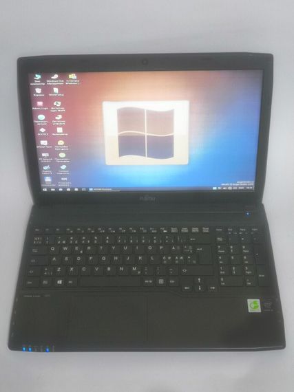 Ноутбук Fujitsu LifeBook A544 / 15.6" (1366x768) TN / Intel Core i3-4005U (2 (4) ядра по 1.7 GHz) / 4 GB DDR3 / 500 GB HDD / Intel HD Graphics 4600 / WebCam / DVD-ROM б/в | Зображення 1