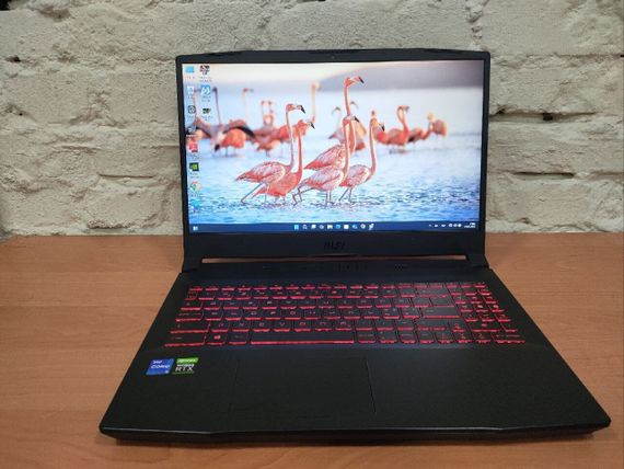 Игровой ноутбук MSI Katana GF66 11UE-021NEU / 15.6" (1920x1080) IPS / Intel Core i5-11400H (6 (12) ядер по 2.7 - 4.5 GHz) / 16 GB DDR4 / 480 GB SSD / nVidia GeForce RTX 3060, 6 GB GDDR6, 192-bit / WebCam б/у | Зображення 1