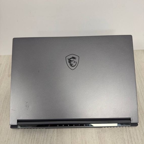 Игровой ноутбук Б-класс MSI Creator 16 AI Studio A1VIG / 16" (3840x2400) IPS / Intel Core Ultra 9 185H (16 (22) ядер по 3.9 - 5.1 GHz) / 32 GB DDR5 / 1000 GB SSD NVMe / nVidia GeForce RTX 4090, 16 GB GDDR6, 256-bit / WebCam б/у | Зображення 7