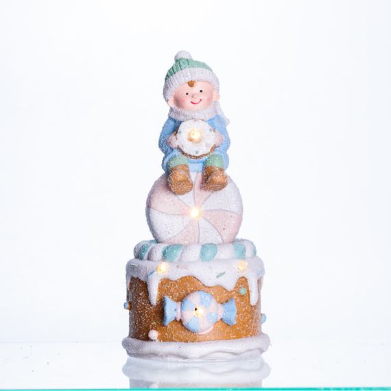 Новорічна декоративна фігурка з підсвіткою 10.5×10.5×20.5 см Новорічний декор Дитина на "солодкій башті" з порцеляни CR-6-14