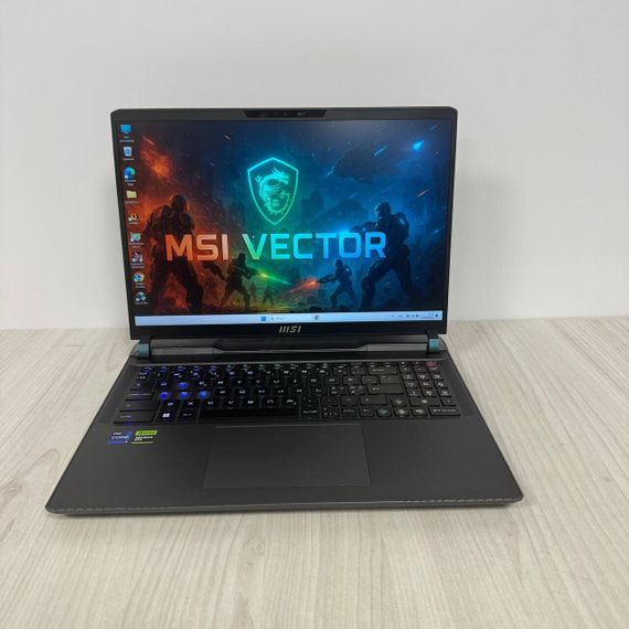 Игровой ноутбук Б-класс MSI Vector GP68HX 12VH / 16" (1920x1200) IPS / Intel Core i9-12900HX (16 (24) ядер по 3.6 - 5.0 GHz) / 32 GB DDR5 / 1000 GB SSD NVMe / nVidia GeForce RTX 4080, 12 GB GDDR6, 192-bit / WebCam б/у | Зображення 1
