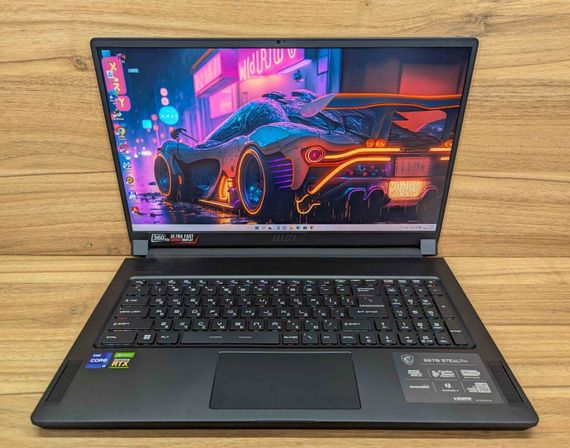 Игровой ноутбук Б-класс MSI GS76 Stealth 11 UG / 17.3" (1920x1080) IPS / Intel Core i9-11900H (8 (16) ядер по 2.1 - 4.9 GHz) / 32 GB DDR4 / 1000 GB SSD / nVidia GeForce RTX 3070, 8 GB GDDR6, 256-bit / WebCam / Windows 11 б/у + Подарок Мышь / USB | Зображення 1