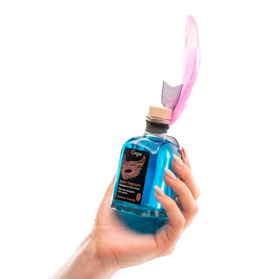 Набір для масажу Orgie – Sexy Therapy Cotton Candy (100 мл), їстівна розігрівальна олія + пір’їнка | Зображення 1