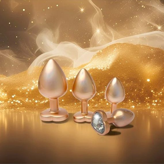 Набір із трьох анальних пробок Dream Toys Gleaming Love, розміри S, M, L, перламутрово-золоті Sex Aura | Зображення 3