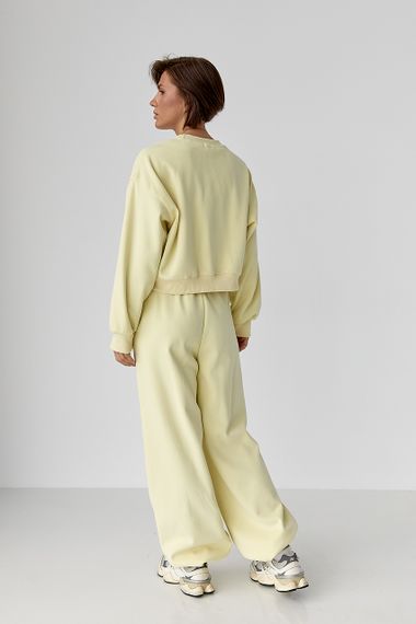 Спортивний костюм із плюшевим начісом з коротким світшотом та штанами палаццо - лимонний цвет, M/L (є розміри) | Зображення 1