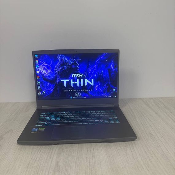 Игровой ноутбук MSI Thin 15 B13vf / 15.6" (1920x1080) IPS / Intel Core i5-13420H (8 (12) ядер по 3.4 - 4.6 GHz) / 16 GB DDR5 / 512 GB SSD / nVidia GeForce RTX 4060, 8 GB GDDR6, 128-bit / WebCam б/у | Зображення 1