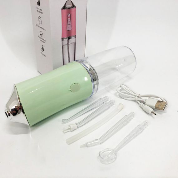 Іригатор для чищення зубів та порожнини рота Oral Irrigator з акумулятором та змінними насадками. Колір: зелений | Зображення 7