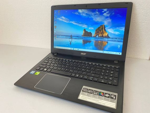 Ноутбук Acer Aspire E 15 E5-575G-587V / 15.6" (1366x768) TN / Intel Core i5-7200U (2 (4) ядра по 2.5 - 3.1 GHz) / 8 GB DDR4 / 250 GB SSD / nVidia GeForce 940MX, 2 GB GDDR5, 64-bit / WebCam / DVD-RW б/у | Зображення 1