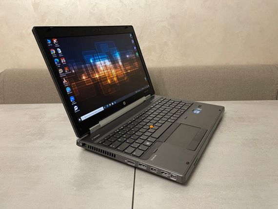 Мобільна робоча станція HP EliteBook 8560w / 15.6" (1920x1080) TN / Intel Core i7-2630QM (4 (8) ядра по 2.0 - 2.9 GHz) / 16 GB DDR3 / 256 GB SSD / nVidia Quadro 1000M, 2 GB GDDR3, 128-bit / WebCam / DVD-ROM б/в + Подарунок Дротова миша / USB | Зображення 4