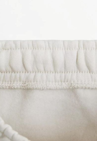 Підліткові теплі спортивні штани-джогери для хлопчика Lefties 152 см Кремові (26090206E) | Зображення 3