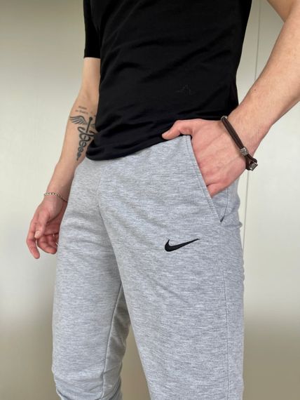 Штани чоловічі трикотажні Nike світло-сірі | Зображення 7
