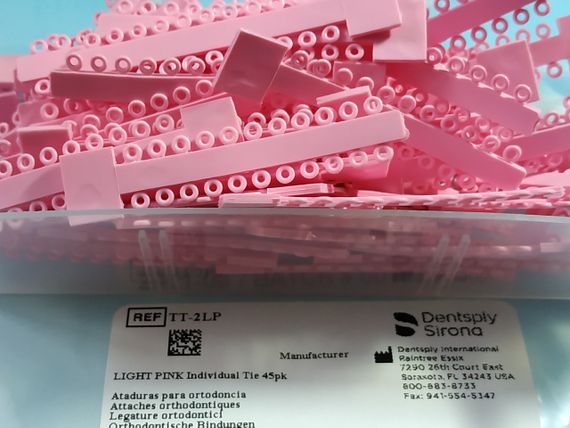Эластическая лигатура цветная (нежно-розовая) пр-во Dentsply-Sirona, 10 шт. | Зображення 1