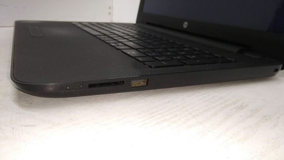 Ноутбук Б-класс HP 15-af130ur / 15.6" (1366x768) TN / AMD E1-6015 (2 ядра по 1.4 GHz) / 4 GB DDR3 / 500 GB HDD / AMD Radeon R2 Graphics / WebCam / DVD-ROM б/у | Зображення 4