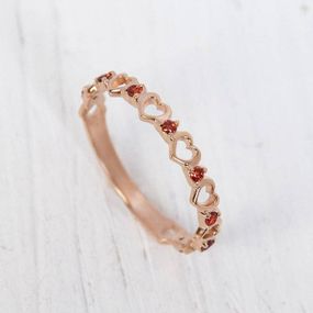 Кольцо из красного золота с гранатами 19.5