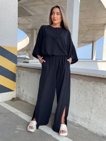 Женский легкий костюм брюки с разрезом и блуза креп-жатка NA2003 цвет черный, размер onesize 42/50